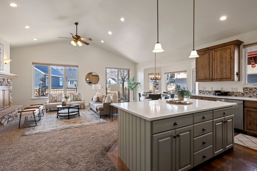 Swiss-inspired architecture, scenic mountain views, and resort-style amenities  Rare single level living in the highly sought-after neighborhood of Valais. This beautifully designed home offers a fabulous open floor plan with vaulted ceilings and a thoughtfully remodeled kitchen (2023) featuring an enlarged island, new quartz countertops, porcelain sink and stainless appliances.  The spacious primary suite includes a luxurious bath with double sinks, shower and separate soaking tub, and a walk-in closet. Two additional bedrooms and two full baths. Quality construction w/ solid knotty alder doors and cabinetry throughout, newer carpet and paint (2023) and timeless finishes.  The homes within Valais are nestled within a serene, wooded setting with ponds and lush landscaping, designed to blend with the natural surroundings. Enjoy truly low-maintenance living with HOA-covered landscaping and snow removal.  Resort-style amenities include a huge clubhouse w/ a basketball court, pool and ping pong, and fabulous gathering spaces inside and out. Three pools (2 outdoor and 1 indoor also with lounge area), direct access to private walking paths, plus nearby tennis and pickleball courts, soccer and baseball fields, playground, and frisbee golf.  Unique to this home is a fully enclosed backyard w/ classy rod iron fencing, perfect for pets. The garage features sturdy overhead metal storage as well as a pull-down ladder to attic for all your gear.  Live the ultimate Heber Valley lifestyle with world-class skiing, golf, hiking, and biking right outside your door! Just 13 minutes to Deer Valley East, 20 minutes to downtown Park City and 45 min to SLC International Airport.