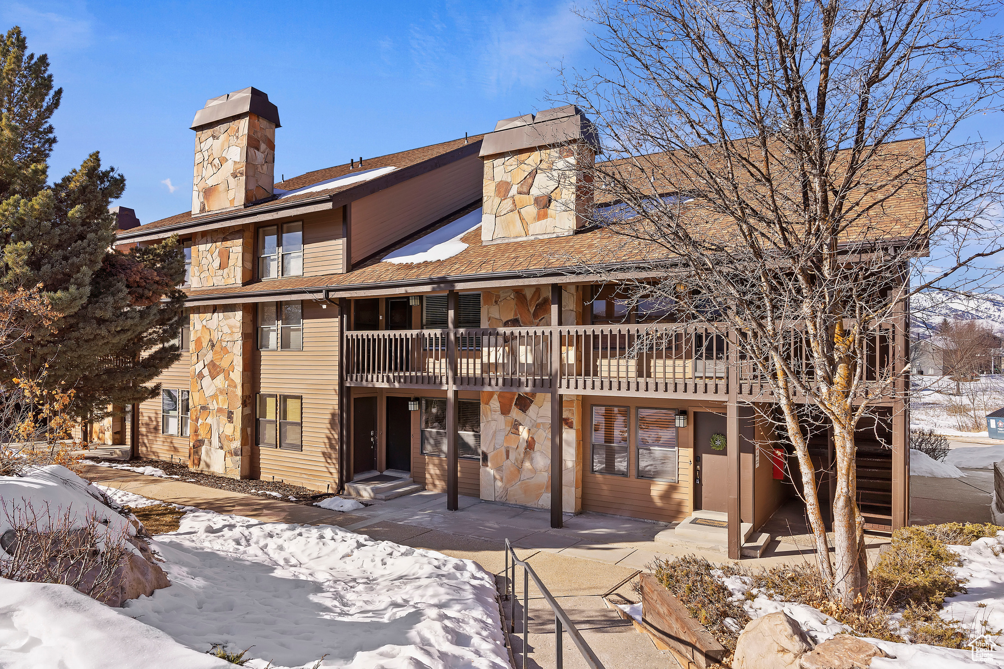 Explore this two-bedroom, two-bathroom condo in Eden, Utah, ideal for your next ski or mountain trip. The updated condo features solid surface flooring in the living area and granite countertops, blending comfort and style. The condo complex includes great amenities like a pool, gym, and clubhouse. This is a turn-key property sold with all furnishing and can be a short-term rental. If you want to find out more about this condo, feel free to get in touch