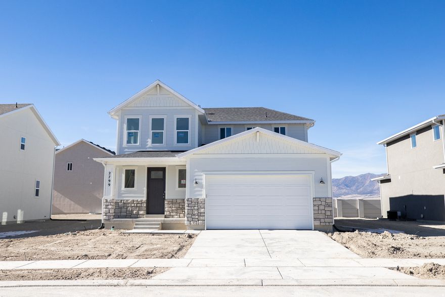 AMAZING $15,000 INCENTIVE TOWARDS CLOSING COSTS, RATE BUYDOWN, OR PRICE REDUCTION REGARDLESS OF LENDER! Must-see Parkway Fields Community in Eagle Mountain! Move-in ready! This beautiful home built by Flagship Homes features 4 bedrooms, 2.5 bathrooms, quartz slab countertops, painted cabinets, laminate flooring on the main level, a large loft on the 2nd floor, landscaped front yard, 2 car garage, and backyard (can be landscaped for an additional charge). Lot back onto church property with decorative concrete wall on boundary. Open 2-story front entrance. The primary bedroom is on the main level and has a vaulted ceiling, large walk-in closet, and dual sinks with a separate tub/shower. With an unfinished basement, this home provides space for storage and room to grow. (If preferred, basement can be finished for an additional charge.) Call for more information or stop by our model home at 1546 E. Starling Lane, Eagle Mountain for a tour. Model home hours: Monday-Saturday 11 AM - 6 PM. Buyers to verify all information. Square footage is from house plans.