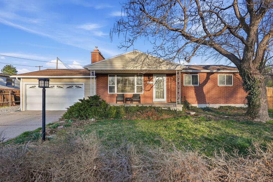 This turnkey brick home is the first-time buyer's secret weapon - a charming, move-in ready residence with a fully rented basement apartment generating income from day one. Live upstairs, let your tenant help cover the mortgage, and build equity in one of the most desirable locations in the city. Upstairs features hardwood floors, a wood-burning fireplace, updated white kitchen with stainless appliances, and an inviting front porch. Two-car garage plus five total parking spaces rounds out a package that's hard to beat at this price point Whether you're buying your first home or your next investment, this one delivers on both fronts - location, cash flow, and long-term upside.
