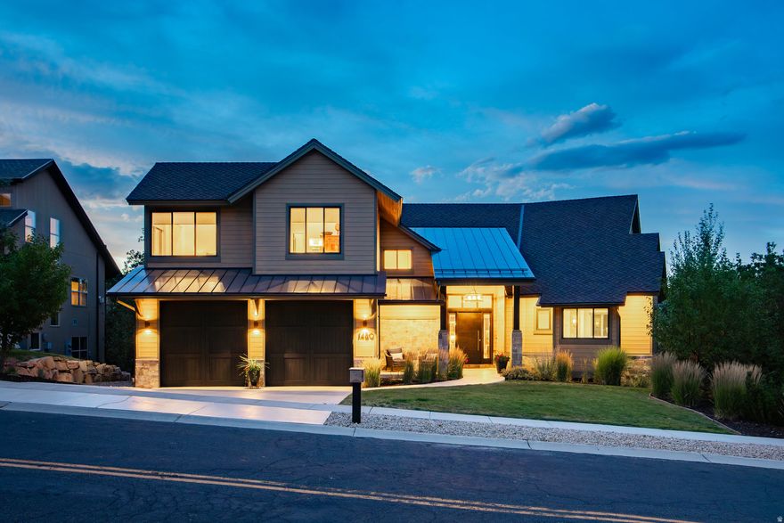 Nestled in Star Harbour Estates-just moments from the newly expanded Deer Valley Resort and the highly anticipated Deer Valley East Village-this professionally designed custom home by renowned interior designer Barclay Butera offers a rare blend of luxury, style, and mountain serenity. With 2 beautiful primary bedroom suites, 3 spacious bedrooms with 5.5 exquisitely appointed bathrooms, every inch of this home exudes comfort and elegance. The main floor showcases a soaring vaulted-ceiling great room with a chef's kitchen that seamlessly flows into an open-concept living and dining area, perfect for hosting aprs-ski gatherings or quiet evenings at home. The main level primary suite is a true retreat, featuring a fireplace and a spa-inspired ensuite with refined finishes throughout. Step outside onto the peaceful deck to take in views of the Jordanelle Reservoir, or head downstairs to a walk-out lower level with a cozy entertaining space featuring a second kitchen, dining, and fireplace that opens to a beautifully landscaped and fully fenced yard-offering privacy and room to entertain. A spacious 3 car garage with a tandem bay, provides extra depth-ideal for storing a boat or recreational gear-making it easy to take full advantage of the nearby Jordanelle Reservoir and its array of water sports. Unlike some of the newer developments, this custom single-family home is situated in an established neighborhood where most homes are already completed-so you won't be living in the middle of years of ongoing construction. In addition to peace and quiet, this home in Star Harbour Estates offers exceptional value, with a price per square foot that is notably attractive compared to the newly released offerings at Deer Valley's East Village and SkyRidge. Outdoor recreation abounds, with mountain biking from your front door, blue-ribbon fly fishing just minutes away, and Jordanelle and Deer Creek Reservoirs close by for boating, kayaking, and paddleboarding. Surrounded by top-tier golf courses and located within easy reach of Heber, Midway, and Park City, this home offers unmatched access to Utah's best four-season lifestyle. And with Salt Lake International Airport less than 40 minutes away, you can touch down and start your vacation the very same day. This is more than a home-it's a private sanctuary in one of the most coveted resort settings in the West.