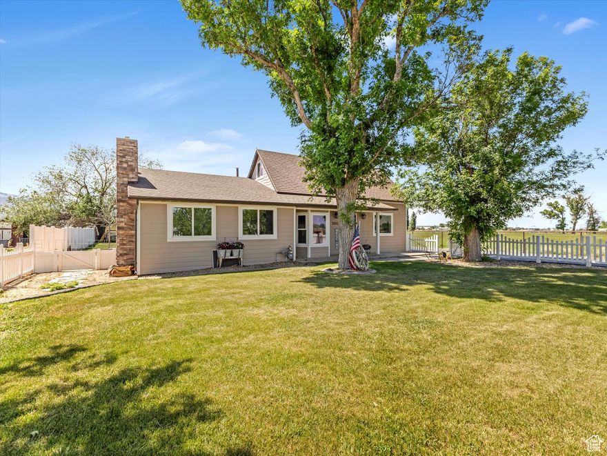 A rare 1-acre property in Benjamin, grandfathered under today's 5-acre zoning! You can't buy or build properties like this anymore in this area. This updated 4-bed, 2-bath home sits on a full acre with a 4 stall barn, arena, and a shop with an ADU, giving you endless options for animals, hobbies, or extra income. Major updates include newer roof, siding, and gutters (2022), a remodeled kitchen, and fresh 2024 finishes throughout. Brand new concrete septic for the ADU. Fully fenced with mountain views and wide-open sunsets, this property delivers the peace of country living with the convenience of nearby Payson. Square footage figures are provided as a courtesy estimate only.  Buyer is advised to obtain an independent measurement.