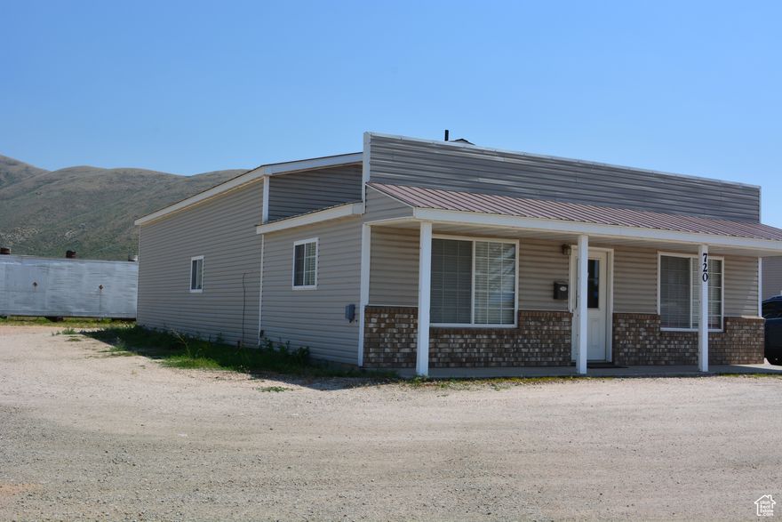 PERFECT LOCATION for a business. This 1800 sqft commercial building has awesome visibility on HWY 30 frontage in Montpelier.  The 30x30 front portion of the building has 3 offices for your business. The back is a 30x30 warehouse/workshop/storage space with an 11x10 garage door, a steel beam that would easily support a lift. It has a tall ceiling. It is a Prime location on Hwy 30. This is a main trucking route going east through Idaho into Wyoming. Come check out this commercial property and relocate your business to Montpelier in SE Idaho. Has Montpelier City water and sewer. Square footage figures are provided as a courtesy estimate only and were obtained from County records. Buyer is advised to obtain an independent measurement.