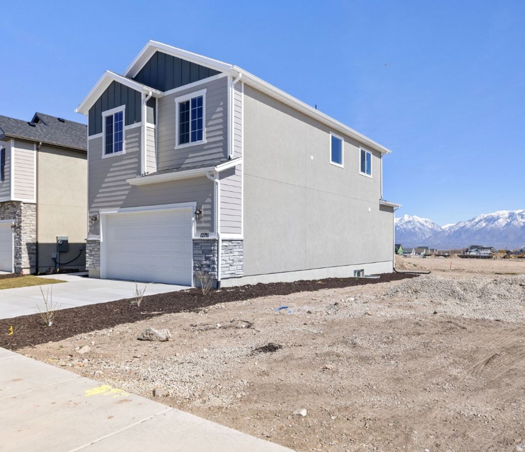 Photo of 12781 S GLACIER TRAIL LN #173, Herriman, UT 84096 (MLS # 2149752)