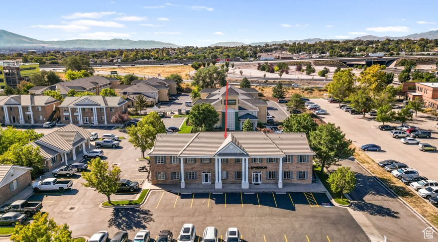Come see this spacious office space located conveniently off of the Redwood Road and I215 exit in Taylorsville! Workforce services are right next door. It has a Redwood address but is about 100 yards from the busy street.  This office offers 2,880 sq. ft., which includes 9-10 offices with many more workstation areas, a kitchen/break area, training space, and two bathrooms ( one on each floor).   This office building also has two entrances, including an upstairs private entrance ( in case you want to separate the top floor from the bottom floor) and ample parking spaces on three sides for your convenience.   Whether you're a small business owner, a startup entrepreneur, or an established professional looking to expand, this office space is an excellent choice for you.   It was listed for rent at $4700 earlier this year but could earn more if done correctly with individuals.   The Seller hates to let this property go because it is so conveniently located off the freeway, but he is moving out of the country at the end of the year and is trying to trim up his portfolio.  Bring all reasonable offers ;)  Members of the Trust include real estate agents and brokers who are currently licensed in Utah as active real estate agents.               Square footage figures are provided as a courtesy estimate only and were obtained from _______County records_______ .  Buyer is advised to obtain an independent measurement. Please contact Josh Christensen for more information.