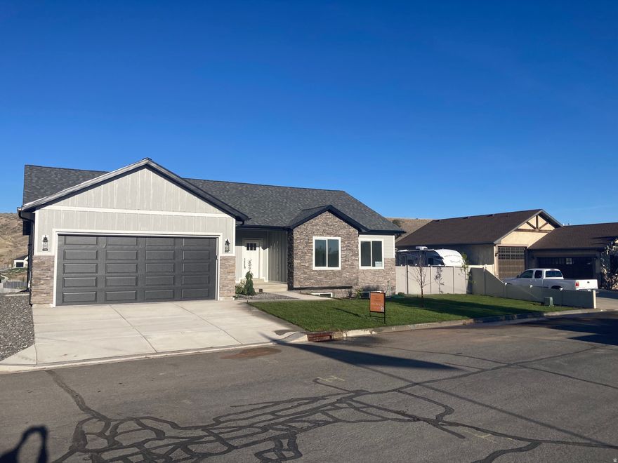 NEW CONSTRUCTION. This new build has lots of upgrades including a nice mix of granite and custom butchers block countertops, premium cabinets with soft close doors and full extension drawers, huge open kitchen/ dining/ great room, LVP flooring, large master walk-in closet, huge pantry, mud room, large laundry room with extra cabinets, large back deck, and much, much more!  Square footage figures are provided as a courtesy estimate only and were obtained from the plans.  Buyer is advised to obtain an independent measurement.