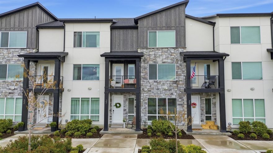 Discover the perfect balance of elevation and elegance in this stunning three-story Providence townhome. Spanning 2,212 square feet, this residence is designed to take you on a journey through modern comfort, one level at a time. It all begins on the ground level, where a spacious two-car garage awaits your vehicles and outdoor gear. Whether you're returning from a canyon hike or heading out for the morning commute, this level offers the seamless transition and storage space a busy life demands. Ascend to the heart of the home, where the walls seem to disappear. This open-concept sanctuary is bathed in natural light, thoughtfully divided into dedicated living and dining spaces. As you move through the home, discover your private mid-level patio. This hidden gem acts as your own outdoor living room, offering a quiet perch to watch the sunset over the valley. With four generous bedrooms and three-and-a-half baths tucked throughout the levels, every member of the household finds their own sanctuary. From the expansive primary suite to the versatile guest rooms, there is a dedicated space for every chapter of your life. Convenience and community define this quiet neighborhood. You're just a two-minute stroll from a spacious family park-perfect for kids and pets-and only five minutes from the local grocery store for those quick ice cream runs. The area is also known for its top-tier school district, with some of the highest-rated institutions in the state. For those who crave adventure, a short 10-minute drive lands you in Providence Canyon, a year-round outdoor playground for hiking, camping, and mountain biking, as well as ATV-ing and snowmobiling. It truly is a peaceful pocket of the world filled with wonderful neighbors! Welcome home to Providence! Square footage figures are provided as a courtesy estimate only. Buyer is advised to obtain an independent measurement.