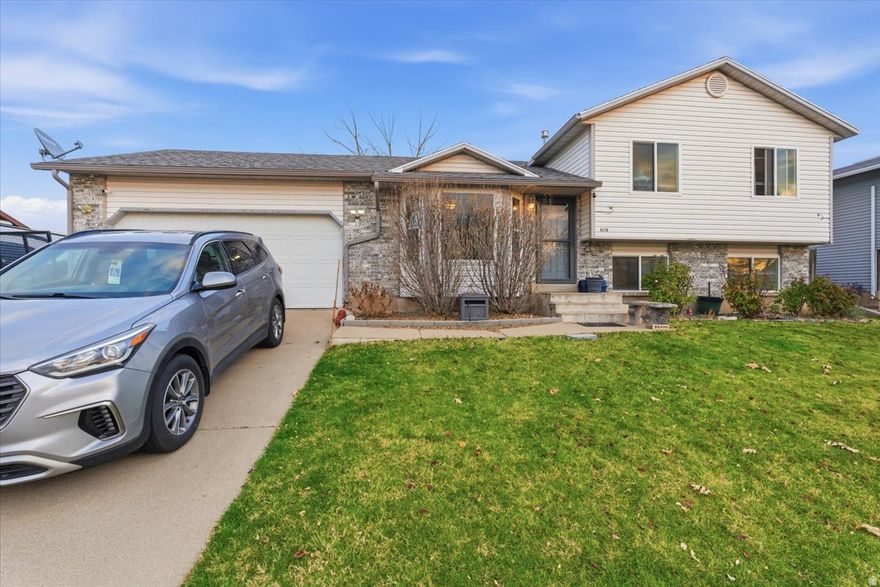 Welcome home to this absolutely charming and beautifully updated single-family gem in one of Roy's most beloved neighborhoods! With 4 spacious bedrooms, 2 bathrooms, and 1,542 sq ft of thoughtfully designed living space, this home blends modern upgrades with cozy comfort in every corner.  Step inside to find a freshly renovated interior --- a bright, stylish kitchen, updated flooring, new paint, and warm, elegant lighting that makes the entire home feel brand-new. The extra-long garage offers wonderful storage or workspace options.  The backyard is truly a retreat! Enjoy a lovely greenhouse, a lifetime shed, and your own mini orchard with peach and apple trees, a blackberry bush, and sweet grape vines --- perfect for gardeners, hobbyists, and anyone who loves outdoor living. Plus, the permanent Jelly Lights installed just two years ago add a magical glow year-round.  Major improvements give you peace of mind, including a newer furnace and AC (2018), new windows and doors (2020), and a new roof (2020).  Tucked in a peaceful location close to grocery stores, great schools, and Emma Russell Park, this home truly offers the perfect mix of convenience, charm, and modern comfort. A rare find you'll fall in love with the moment you arrive!  Square footage figures are provided as a courtesy estimate only and were obtained from county records .  Buyer is advised to obtain an independent measurement.