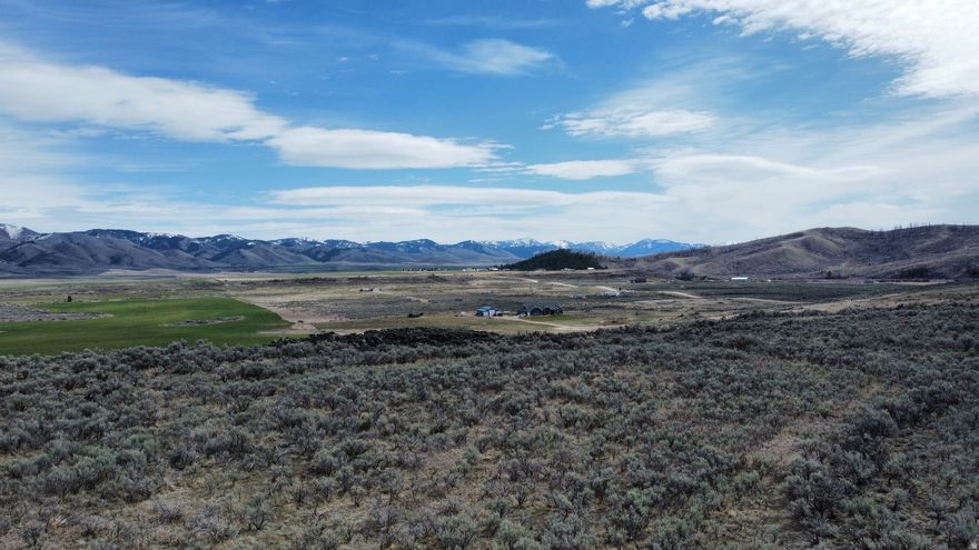 Explore beautiful acreage in Soda Springs and experience the charm of Caribou Village! This 5-acre property features incredible panoramic views of the valley and surrounding mountains. With flat, usable land, it's an excellent setting to build your dream home and create the space you've always wanted. It also makes a wonderful retreat for a second home getaway. Each lot includes road access and available power. Reach out to the listing agent with questions or to see!
