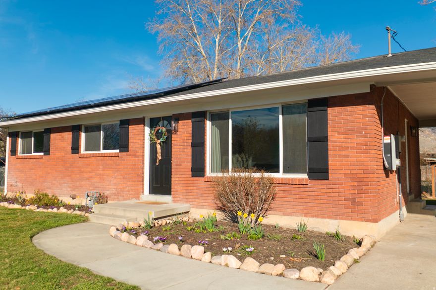 Beautifully updated 3-bedroom, 1-bath single-family home offering the perfect blend of modern comfort, functionality, and convenience. Thoughtfully remodeled and truly move-in ready, this home features bright, open living spaces, stylish finishes, sleek countertops, stainless steel appliances, and durable updated flooring throughout. The versatile layout is ideal for first-time buyers, students, professionals, or anyone seeking a low-maintenance home with character.  Step outside to a private backyard retreat featuring a dedicated garden plot and mature apple trees-rare features that add warmth, personality, and potential for gardening, outdoor living, or hobby homesteading. Located just minutes from two universities, two major malls, parks, dining, shopping, and the FrontRunner station, this home offers exceptional access to everyday amenities, transit, and commuter routes. A unique opportunity to own an updated home with standout outdoor features in a highly convenient location-schedule your showing today. Buyer is to take over Solar.