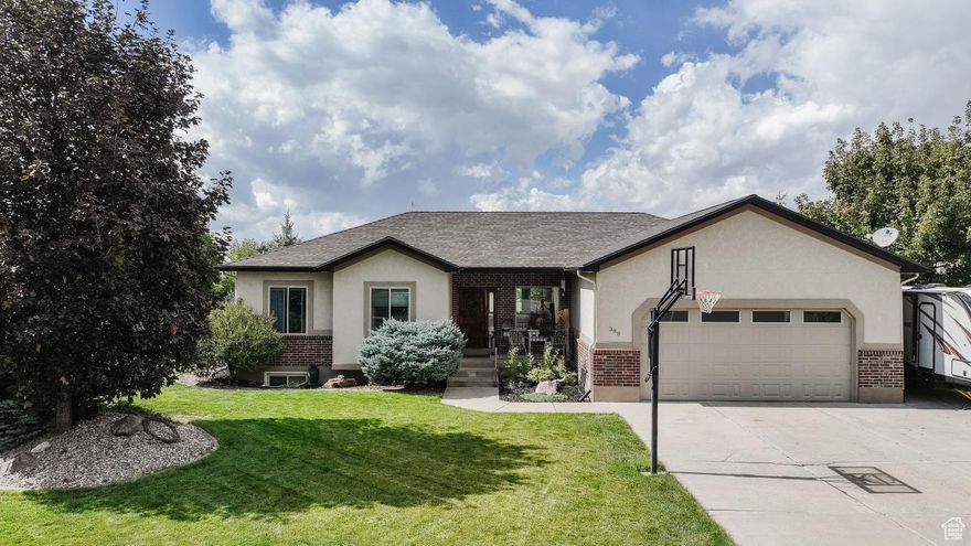 Welcome home to this beautiful stucco and brick property in the heart of Richmond!  Featuring 6 bedrooms and 3.5 baths, this spacious home offers gorgeous LVP flooring throughout main level and large windows that let in plenty of natural light. Open kitchen, semi-formal dining area and living space area with laundry room right off of garage with a 1\2 bath make for easy access. Step out onto the main-level deck to soak in breathtaking sunsets, or enjoy the fully fenced backyard that's perfect for gatherings, pets, or play.  There is ample storage in the basement for all of your personal items along with a cozy family room downstairs with a walk-out basement onto your patio dining area.   This home combines modern comfort with an ideal location-close to everything Richmond has to offer.