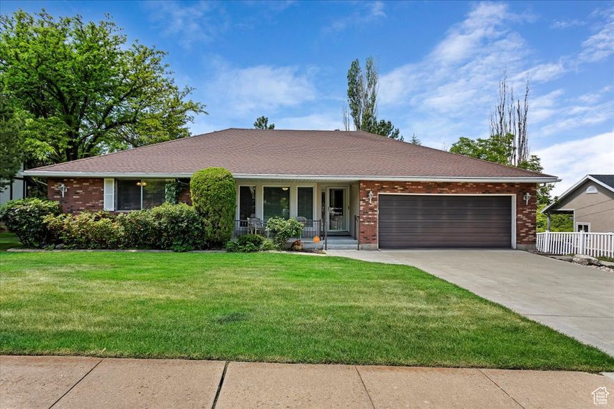 Beautiful updated home nestled in a highly sought after location perfect for entertaining and everyday living. Open layout with custom kitchen cabinets, large kitchen island providing ample storage and prep space, 2 fireplaces, updated paint and flooring, radiant heat, security system, water softener, oversized garage, RV pad, covered back deck overlooking the secluded backyard perfect for the summer BBQ's. Sq. footage and property facts are provided as a courtesy; Buyer to verify all information.