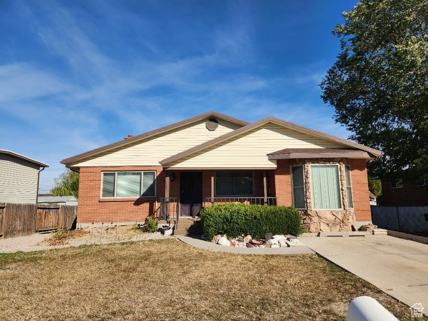 A Brick Rambler with all the perks. Home has been updated with new waterproof flooring in living room and hallway. 2 kitchens, 2 laundry rooms, 2 fireplaces and separate entrance for basement. Main kitchen has large island and big slab of granite countertop on the island, around the sink and around stove top. AC and furnace updated in 2022. House comes with solar and all appliances on the main floor and some in basement. Additional basement rental income $1500 every month with this house.