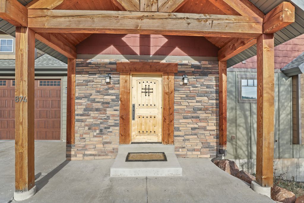 Photo of 874 S BALSAMORHIZA RD, Garden City, UT 84028 (MLS # 2122721)