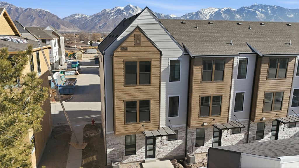 Photo of 7327 S SIDELINE LN W #60, Midvale, UT 84047 (MLS # 2143419)