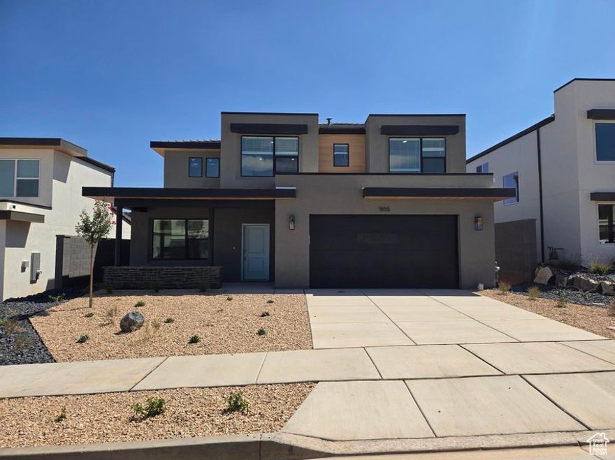 Introducing the Slickrock floorplan in the Long Valley community in Washington City, Utah. This inviting 2-story home offers a spacious 5 bedrooms, primary on the main, an office, 3.5 bathrooms, and a 2-car garage with an added toy garage. Move-in September. Use DHI Mortgage, our preferred lender, and receive $7,000 toward closing costs & qualify for our special finance incentives saving you hundreds on your monthly payment. Experience the joys of living in the Slickrock at Long Valley! Contact Tyler today to walk through and see if it's the right fit for you. You will love this beautiful floorplan located in a spectacular community  Actual home may differ in color, material, and/or options. Pictures are of a finished home of the same floor plan, and the available home may contain different options, upgrades, and exterior color and/or elevation style. Buyer to verify square
