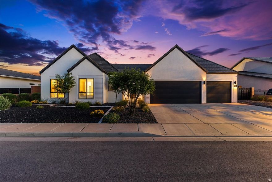 Welcome to the ultimate Southern Utah getaway! This immaculate single-level home in the desirable Whitworth Estates of Washington Fields feels brand new. Gently lived in as a second home since 2022 and occupied only a handful of times, it presents in pristine condition with fresh, sophisticated finishes throughout. The backyard is an absolute jaw-dropper, a stunning private oasis, on just under one-third of an acre, built for play and memorable get-togethers. Take a dip in the sparkling pool and hot tub, gather around the cozy fire pit among stunning red rock vistas, relax under the charming lighted gazebo, or enjoy some friendly competition on the illuminated pickleball court. Thoughtful xeriscaping with lava rock and lush green turf deliver beauty with minimal upkeep, so you can spend more time living and less time maintaining. Inside, its inviting open-concept layout creates a warm, spacious setting, ideal for comfortable living and effortless entertaining. The well-appointed kitchen with gorgeous quartz countertops and a large island flows seamlessly into the bright great room and dining area. The roomy primary suite offers a tranquil retreat, and down the hallway you'll find a tucked-away flex space/bonus room that provides a versatile and more secluded hangout. Conveniently located near newer restaurants, shopping, schools, and more, this exceptional home blends modern comfort, low-maintenance elegance, and outstanding outdoor living in one of Washington Fields' prime spots. This one is a rare find! Come experience it for yourself.