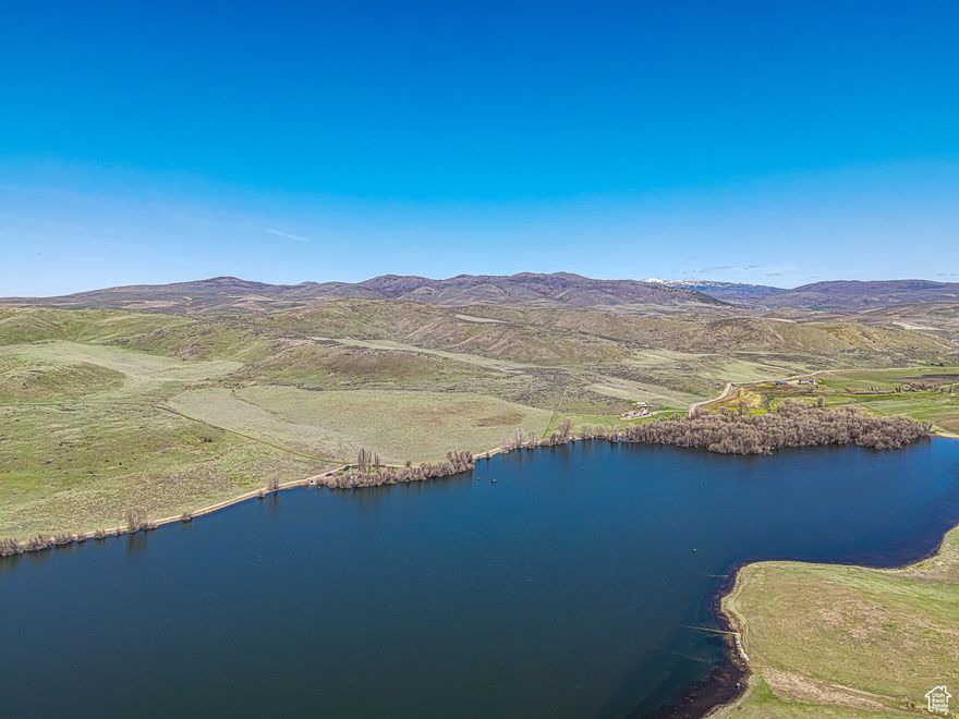 Your piece of heaven by Treasureton Reservoir.  Priced to sell. Buyer will have to install well and septic system. Don't miss out on the spectacular views on this lot partially waterfront. From Hwy 34, turn left onto Treasureton Rd./Main St. Left again on 6700 N. Buyer to verify all data.