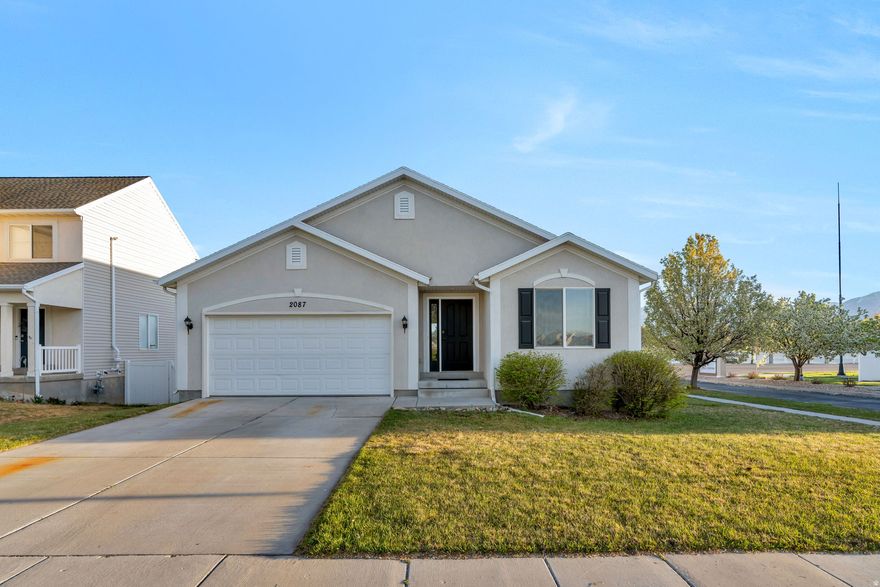 OPEN HOUSE SATURDAY, APRIL 11th 11-1 PM. Just listed in Loch Lomond.  Wonderful Rambler on a corner lot.  Enjoy the views of Utah Lake.  Fenced in yard.  The home is brand new LVP flooring.  This home is located right off 1100 west in Lehi. Close to all the amenities yet still maintains a rural vibe. The perfect starter home or investment property with room to grow in the basement. The home is in nice condition and priced just right for a quick sale.