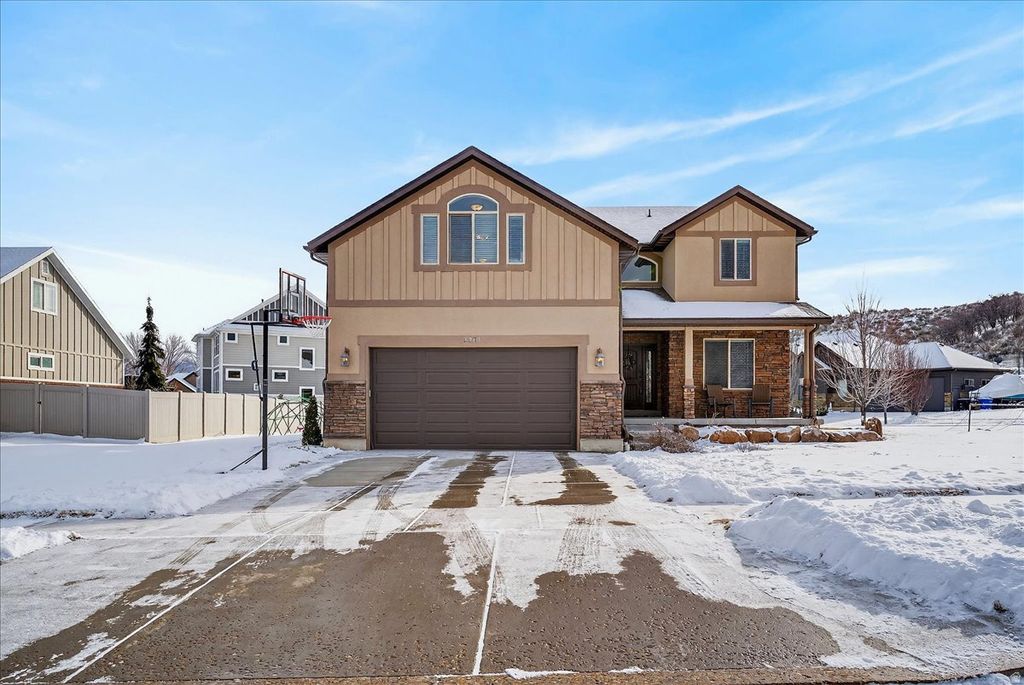 Photo of 5980 RAWHIDE CT, Mountain Green, UT 84050 (MLS # 2139224)