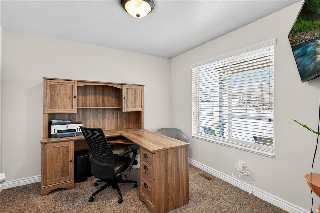 Photo of 5980 RAWHIDE CT, Mountain Green, UT 84050 (MLS # 2139224)