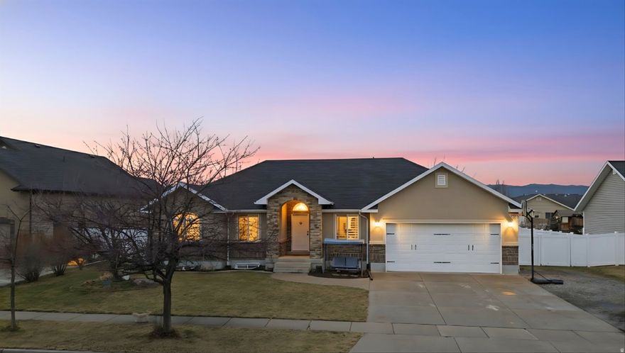 This beautifully maintained rambler offers comfortable main-level living with the added space of a fully finished basement. The updated kitchen features modern finishes and a functional layout, perfect for everyday living and entertaining. Step outside to a large, fully fenced backyard where you can relax and take in the stunning views of the Wellsville Mountains. With plenty of space both inside and out, this home combines convenience, comfort, and incredible scenery in a setting you'll love coming home to.