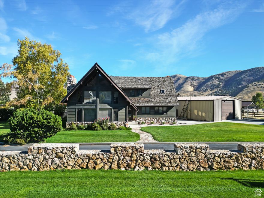 Have you been waiting for an incredible home in Mantua?  This one might just check off all of the boxes.  The home is a vaulted two story with an unfinished basement.    The main level has tons of natural light and is wide and open.   There is a large kitchen / great room area as well as a very big gathering area in the front of the home with great views and a gas fireplace.   There is a bedroom on the main floor that would also make a great office.   Upstairs you will find an additional 3 bedrooms and 2 baths as well as another living space.   There is a great upper deck as well as a lower deck area.   The basement has tons of potential and has a great workshop area with an outside entrance.   The home has two large covered RV parking spots and a massive 40 x 60 garage that has a 14 foot door.   The garage is insulated and has it's own heater.   The yard is fenced and fully landscaped.   There is a huge circular driveway and tons of space and incredible views in all directions.   Come and see the possibilities of this home today!