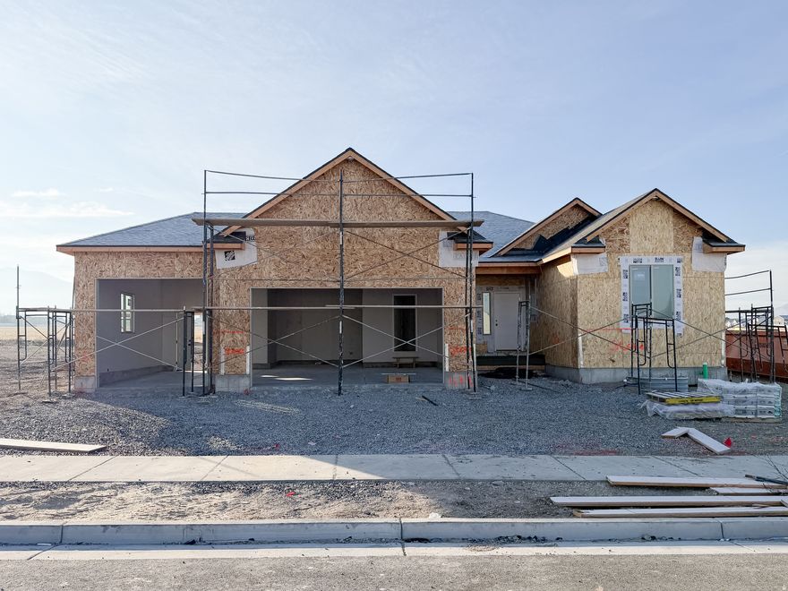 The Harrison is one of Perry Homes' most popular floor plans. The open concept and vaulted ceilings make the space open and inviting. Enjoy the LVP through the main living areas, upgraded carpet in the bedrooms, and tile in all wet areas. The kitchen has painted cabinets with accented alder stain throughout. The quartz countertops are a beautiful addition. This home will be finished mid February! Ask about our Preferred Lender Incentive!   Square footage figures are provided as a courtesy estimate only and were obtained from builder's plans .  Buyer is advised to obtain an independent measurement.