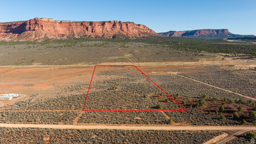 Discover the perfect canvas for your dream home on this expansive 10-acre property, nestled in the heart of breathtaking Red Rock country. Surrounded by native juniper and sage, this serene landscape offers both privacy and panoramic views -- ideal for those seeking a peaceful escape or a base for adventure. The property borders BLM land, ensuring unobstructed natural beauty and direct access to wide-open spaces. A 1-acre foot water right is included, adding essential value and flexibility for future improvements. Whether you're an equestrian enthusiast or simply crave the freedom of open land, this property offers endless possibilities. Enjoy easy access to some of Southern Utah's most iconic destinations, including the Grand Staircase-Escalante, Zion National Park, Bryce Canyon, and the North Rim of the Grand Canyon. Don't just visit the beauty of the Southwest -- live in it. (Buyer to verify all)