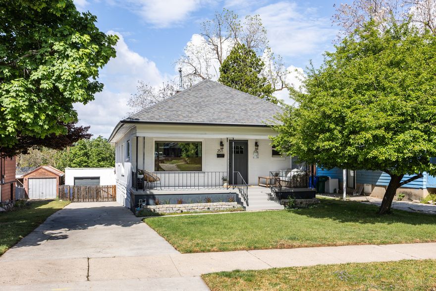 This warm and well-kept home in Ogden is seated quietly in a sought-after and well-located neighborhood. Thoughtful details and smart updates have brought this property-built at the turn of the century-into the modern era, but some of that historic charm can still be felt throughout. We'll start with the curb appeal, which is easy to see: a tidy front yard and porch that's just perfect for an evening of star gazing or a cup of coffee are just the beginning here. Inside, you'll find beautifully designed spaces and plenty of room for whatever you need. Nearly everything was remodeled in 2018, and the result is a home with equal parts convenience and comfort. The open floor plan seamlessly blends the primary living space with the kitchen/dining area (always a plus for those who love to entertain), and both are brimming with natural light, thanks to a pair of large picture windows. The kitchen affords not only ample cupboard space and bit of open shelving, but a dedicated pantry nearby. From there, you can access an office, one of the bedrooms, a bathroom, and a space that was remodeled specifically for the purpose of creating a huge walk-in closet. Downstairs, a cozy living space is accompanied by two more bedrooms, a dedicated laundry area, another remodeled bathroom, and a generous storage space with plenty of shelving. The back yard will make for a memorable summer, thanks to a covered patio off the home, another sitting area with a firepit, and a veggie garden for your green thumb. Your own driveway and a one-car garage are the cherries on top of this adorable home, which also happens to be located close to downtown Ogden, for nights out with the best food and drink. Better jump on this one.