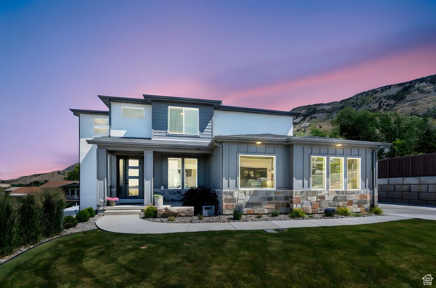 Discover a breathtaking 6-bed, 4-bath masterpiece in the coveted Ashlyn Lane enclave of Pleasant Grove! Perched on the scenic east bench, cradled between Grove Creek and Battle Creek Trailheads, this 2022-built gem serves up jaw-dropping, unobstructed vistas of towering mountains, shimmering Utah Lake, and sweeping valleys. Spanning 3,715 sq ft, this modern 2-story haven blends luxury, comfort, and savvy income potential. The expansive walk-out basement apartment-complete with 2 bedrooms, a full bath, sleek kitchen, and private laundry-is perfect for guests or rental income. Upstairs, the open-concept main level dazzles with a gourmet kitchen, elegant dining area, cozy den, and sprawling family room. Retreat to the upper level's 4 serene bedrooms and 2 spa-like baths. Outside, the 0.28-acre lot in a tranquil cul-de-sac boasts manicured landscaping and panoramic mountain views. Park with ease in the oversized 2-car garage or ample driveway. With central air, gas heat, double ovens, and chic finishes, every detail exudes quality. Nestled in the top-rated Alpine School District, steps from shops, parks, and trails, this move-in-ready treasure won't wait-book your private tour today!  Square footage figures are provided as courtesy estimates only and were obtained from county records. Buyer is advised to obtain an independent measurement.