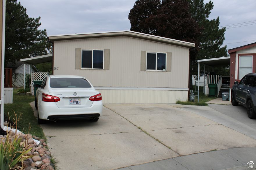 Step into this beautifully updated mobile home in the sought-after Northcrest community of Roy, UT.   The Master Bedroom shines with complete renovations including new flooring, false ceilings, and upgraded vents. A brand-new fourth room adds flexible space for an office, guest room, or playroom, seamlessly integrated into the home. The kitchen has been fully upgraded with sleek new cabinets, a gas stove, and durable ceramic flooring, making it both stylish and practical for everyday living!  Significant investments have been made in essential systems, including a $11,000 new roof, brand-new central air, and $12,000 in several upgrades including the ventilation system for both the Master and added room, ensuring comfort year-round.  Outside, enjoy a mature nectarine tree and a small garden - perfect for homegrown fruit and vegetables!