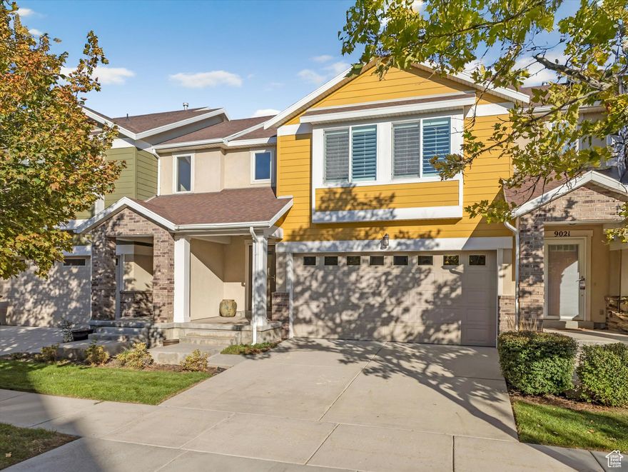 Perfectly located near shopping, dining, and walking trails-and just minutes from I-15-this beautiful home is ready for its new owners! The main level features soaring vaulted ceilings in the living room and a well-appointed kitchen with granite countertops, a center island, pantry, and stainless-steel appliances, including a gas range and a French-door refrigerator that stays. A convenient half bath and two-car garage complete the main level. Upstairs offers a versatile loft, three bedrooms, and two full bathrooms, including a spacious owner's suite with a walk-in closet and en-suite bath featuring a soaking tub and separate shower. The laundry is also located upstairs near the bedrooms, and the washer and dryer are included. Additional highlights include beautiful plantation shutters throughout and a covered patio off the main living area. From the beautiful interior finishes to the exceptional community amenities-clubhouse, pool, hot tub, fitness room, and playground-this home offers the perfect blend of style, comfort, and location. Don't miss the chance to make it yours!