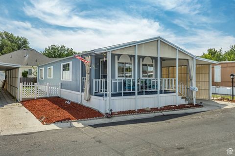 Photo of 1101 W BARBERRY DR S, Taylorsville, UT 84123 (MLS # 2103279)
