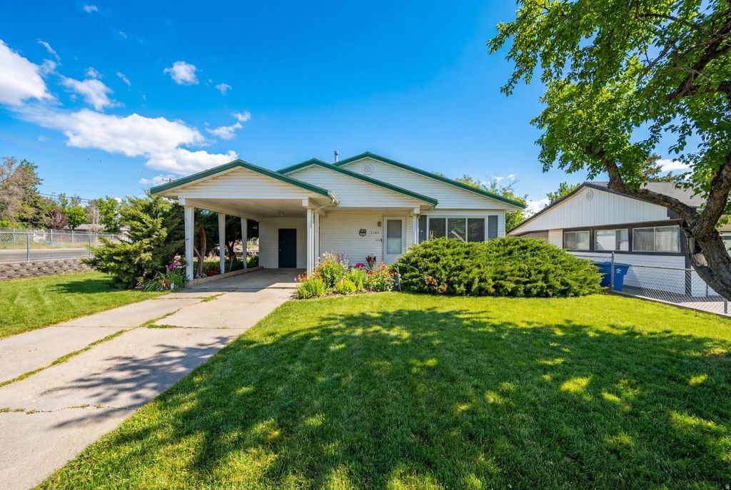 Photo of 2162 W WESTFIELD CIR S, West Jordan, UT 84084 (MLS # 2138058)