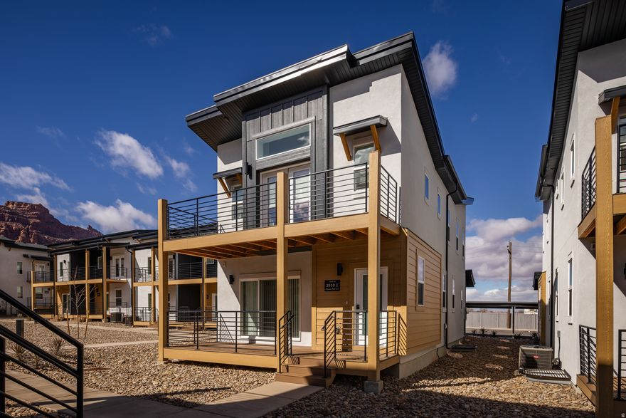 DESERT SOL - Welcome to Desert Sol Villas, an exceptional new luxury townhome community thoughtfully designed in Moab.  This 6 bedroom, 4 bathroom residence offers generous living space, modern finishes, and seamless indoor-outdoor flow that complements the surrounding red rock landscape. The open-concept layout features a well-appointed kitchen with quality stainless steel appliances, spacious primary suites, in-unit washer and dryer, and abundant storage to accommodate both everyday living and recreational gear. Expansive windows invite natural light while framing Moab's iconic scenery, creating a warm and inviting atmosphere throughout. Step outside to a private outdoor deck designed for taking in Moab's stunning red rock views and evening sunsets. Whether hosting friends, enjoying morning coffee, or unwinding after a day on the trails, the deck extends the living space and captures the peaceful desert setting. Community amenities include a dedicated dog park, offering space for pets to enjoy the outdoors close to home and ample parking is available for residents and guests. Located in a quieter area of Moab with convenient access to shopping, dining, and recreation, this home offers a balance of privacy and accessibility. Just minutes from Arches National Park and Canyonlands National Park, with easy access to hiking, biking, and the Colorado River, this is a rare opportunity to own new construction in one of Utah's most sought-after destinations.  Up to $15,000 in Closing Costs incentives from the Seller and Preferred Lender!