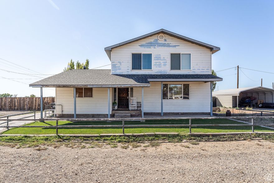 This darling home is in an amazing price range! This home offers a large dining room, a wood burning stove in the family room to keep you nice and cozy in the winter, a large walk in closet, 1.5 bathrooms, and two bedrooms. The upstairs was newly remodeled and is immaculate condition. This home sits on .35  acres, the back yard is fully fenced and it has a carport for storage. A additional foundation was poured to the side of the home for someone to add additional living space if desired! Buyer to verify all information is correct. Call for a showing today!