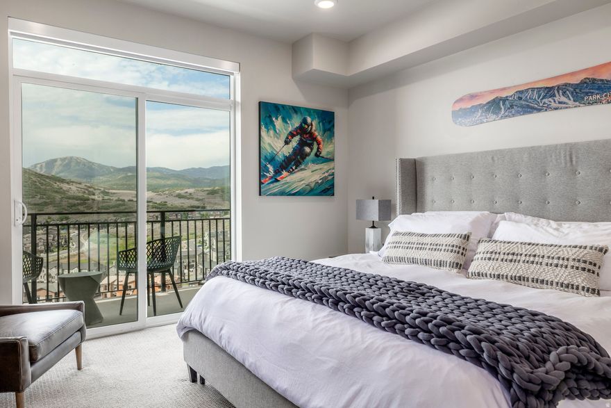 Soak in breathtaking Deer Valley ski run and Jordanelle Reservoir views as you sip coffee by the fireplace or out on your private patio. This light and bright two-bedroom, two-bathroom residence is located on the top floor at Black Rock Mountain Resort features chic mountain-modern upgraded finishes and comes fully furnished. The versatile lock-off floor plan offers flexibility and maximizes rental potential. Enjoy resort-style living with on-site amenities including elegant lounge spaces with fireplaces, a coffee bar and market, restaurant and bar & grill, year-round heated pool and hot tub, steam room, sauna, and a fully equipped fitness center. Perfectly located with easy access to hiking and biking trails, this condo is just 12 minutes to Park City Mountain Resort, 11 minutes to Deer Valley's new East Village, the Jordanelle Reservoir, and 40 minutes to Salt Lake City International Airport.