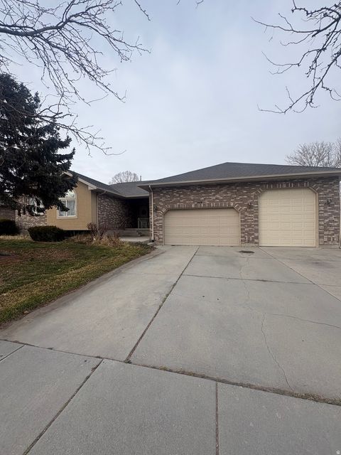 Photo of 3918 W MAPLELEAF WAY S, West Jordan, UT 84088 (MLS # 2136453)