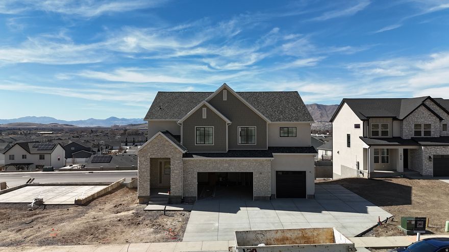 Come and see the Aubrey floor plan. Our newest in the Payson View South subdivision. This new home boasts views from all sides of the home! Beautiful views of the valley and Payson Temple from the back of the home, and unobstructed mountain views from the front door. You will have to see the sunset views to believe it! The Aubrey is a perfect gathering space with a large main floor dedicated to entertaining with soaring windows, a statement fireplace, and a spacious kitchen. Come and see what this 4,700 SF home is all about! To top it off, add a $20,000 preferred lender incentive! Reach out for all the details!