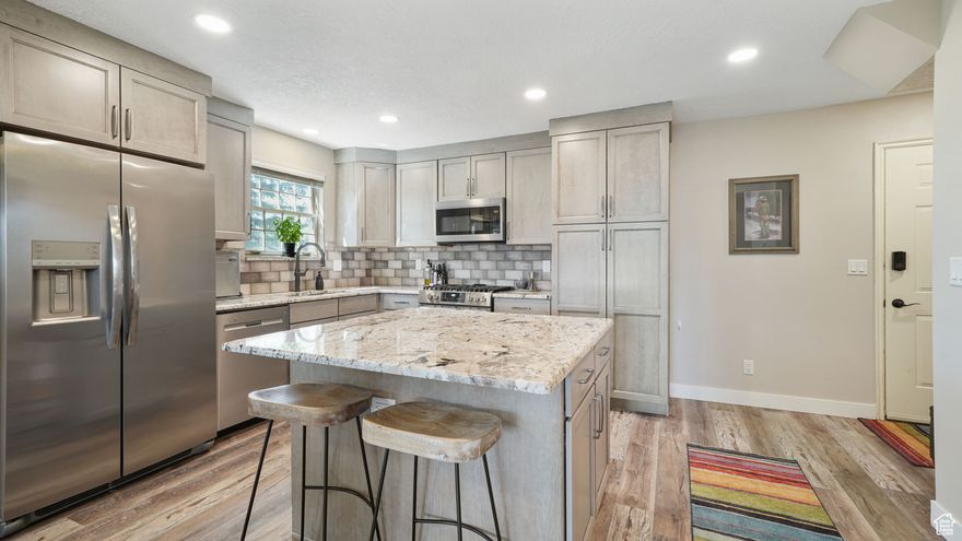 Welcome Home to Your Swiss-Inspired Retreat in Midway!  Discover serenity and charm in this beautifully updated, single-level gem nestled within Midway's beloved Swiss Oaks community. One of only two proud owners, the current residents have lovingly transformed this home with elegant finishes and thoughtful design throughout.  An open-concept floor plan unfolds beneath cool-toned luxury vinyl plank flooring. The stunning kitchen features custom granite countertops, a spacious island with ample storage, and sleek stainless steel appliances-perfect for entertaining or relaxing at home.  The spa-like master suite boasts updated lighting, granite accents, and premium flooring. Both bathrooms have been tastefully remodeled to offer comfort and style. Step out to your private balcony, tucked among mature pines, where mountain breezes and peaceful seclusion await-ideal for morning coffee or afternoon unwinding.  Convenience is key with a dedicated underground parking space and a large 10x14 lockable storage room-plenty of room for your outdoor gear and toys.  Swiss Oaks offers resort-style amenities: clubhouse with spa, sauna, steam room, gym, pickleball court, playground, and dog park. HOA includes fiber internet, snow removal, grounds maintenance, and water/sewer.  Pets allowed with restrictions. No nightly rentals permitted, maintaining the community's peaceful charm.  Located just 5 minutes from downtown Midway's shops and dining, 12 minutes from Deer Valley East Village ski resort (more lifts coming!), 25 minutes to Park City or Provo, and 45 to SLC airport. Year-round adventures await: 108 championship golf holes (more to come!) and epic blue-ribbon fishing, hiking, biking, skiing, and snowmobiling.  Whether you're seeking a primary home, mountain getaway, or smart investment, this impeccably maintained condo delivers style, comfort, and unbeatable access to everything Midway and Park City have to offer.  This is your special place-come experience the magic of Midway!  Square footage is a courtesy estimate. Buyer to verify independently.