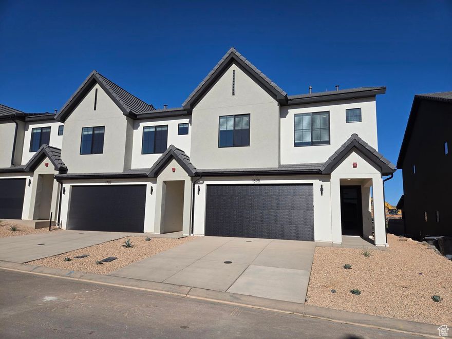 END UNIT NIGHTLY RENTAL APPROVED, completion Dec/Jan! You'll find a smartly designed townhome with the Crescent floor plan in our Long Valley community, in Washington City. The Crescent is a 2-story townhome with 4 bedrooms, 4.5 baths, a 2-car garage. On the first floor, the home can be accessed through a covered front porch, or a garage that leads to the kitchen. The main living space is an airy, open-concept kitchen, nook and family room with plenty of space. The attractive kitchen has a large center island, stainless steel appliances such as a dishwasher, range, and microwave as well as shaker-style cabinets. A covered patio on the main floor provides shade for outdoor dining and relaxing  A highlight of the Crescent floor plan is that each of the second floor's four bedrooms has its own en suite bathroom, which lends the home to use as a short-term rental property. The second story also has a loft space that can serve as a gathering or media area, and a laundry room ideally placed near all the bedrooms. For those seeking both privacy and room to gather, the Crescent floor plan in Long Valley provides both. Enjoy the community pool, pickleball courts, outdoor ping pong & cornhole, children's playground, and more! Ask me about our included generous home warranty and smart home package! Receive $13,000 toward closing costs with our preferred lender DHI Mortgage! The actual home may differ in color, material, and/or options. Interior pictures are of a finished home of the same floor plan and the available home may contain different options, upgrades, and exterior color and/or elevation style. Square footage figures are provided as a courtesy estimate only and were obtained from building plans.