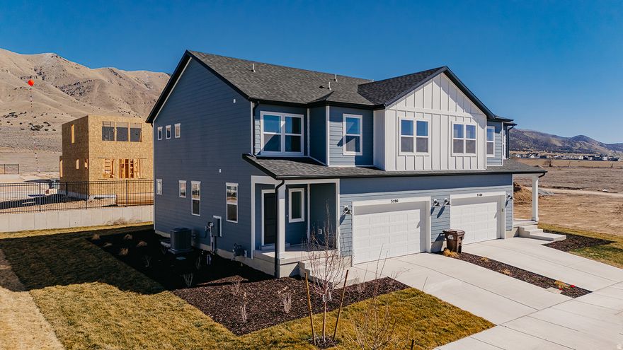 Best Value in Eagle Mountain  Move-In Ready QMI in Cedar Grove!  $25,285 In Upgrades Including a Craftsman exterior with full Hardie siding, expanded family room windows for added natural light, and a rear composite deck with upgraded sliding glass door. The upgraded kitchen features quartz countertops, soft-close cabinetry, a 5' x 3' island, and Whirlpool fingerprint-resistant gas appliances, while luxury vinyl flooring runs throughout the main living areas and baths. The owner's suite offers a spacious 60" x 42" walk-in shower with upgraded glass and a double-sink vanity, plus enhanced lighting, Smart TV wiring, and included rear yard landscaping.  This Dawson floorplan offers 3 bedrooms and 2.5 baths with an open-concept layout designed for everyday living and entertaining, seamlessly connecting the kitchen, dining, and family room.  Enjoy Cedar Grove amenities including a clubhouse, pool, 1 Gig fiber internet, and a future dog park, all near schools, shopping, and outdoor recreation.  Incentives available including closing cost assistance-ask about preferred lender programs!