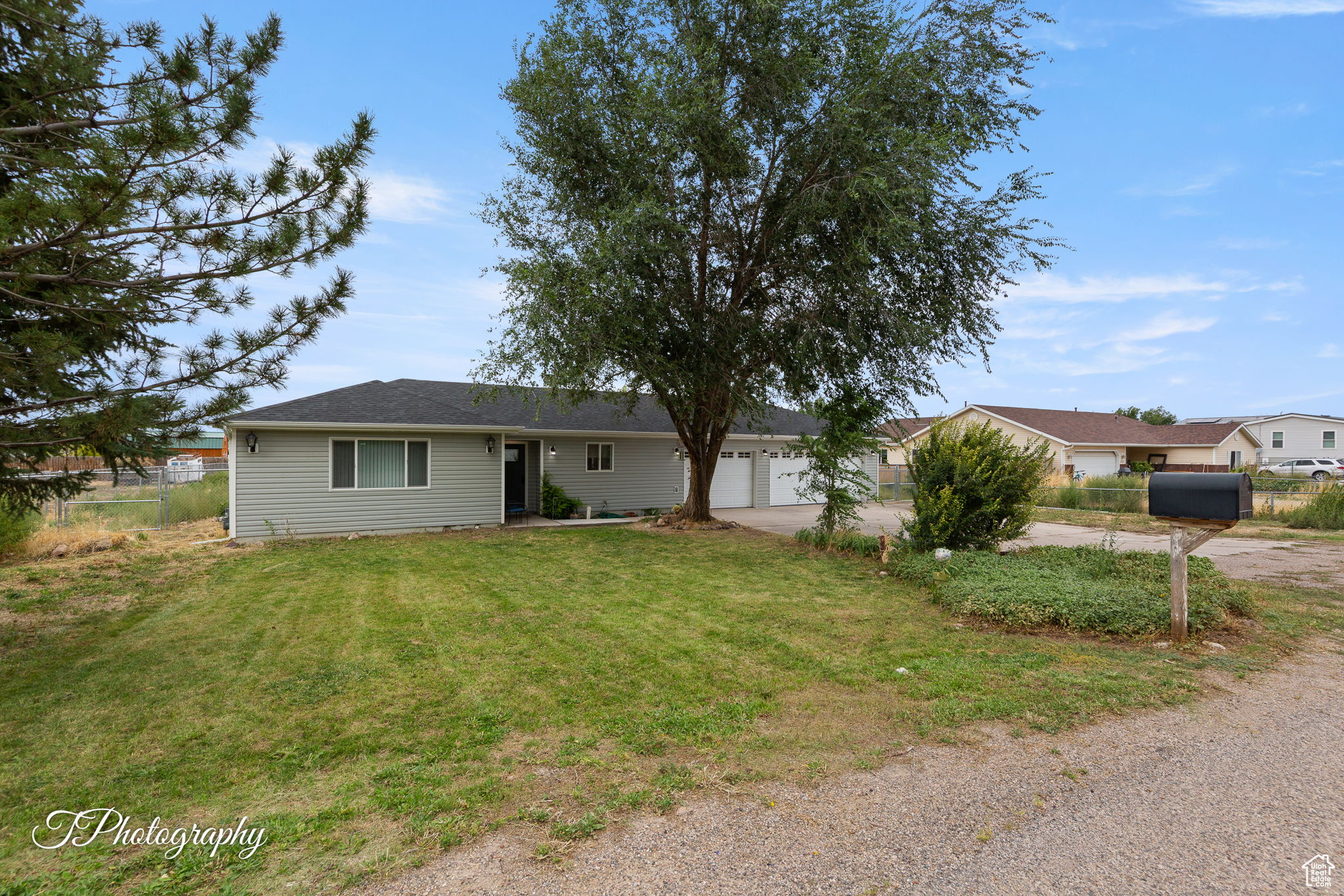 Come and see one of the Newest homes in the subdivision. Why buy a fixer upper when you can have a home just over 3 years old. Due to house fire in 2019 it is a complete rebuild. This charming rambler has a 3 car attached garage. Come and enjoy the peace and quiet of the Country life on almost a half acre. Bring your horses or other animals and call this home. Small tack shed and animal shelter in a fully fenced back yard. Plenty of room to park your toys, RV or whatever you want to store. Beautiful Mountain Views from this Perfect Ranch Rambler.