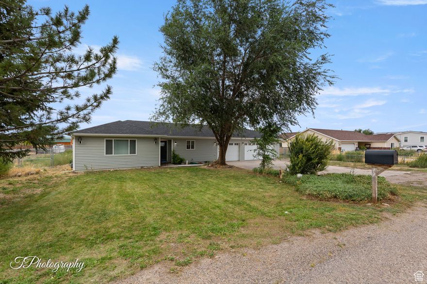 Come and see one of the Newest homes in the subdivision. Why buy a fixer upper when you can have a home just over 3 years old. Due to house fire in 2019 it is a complete rebuild. This charming rambler has a 3 car attached garage. Come and enjoy the peace and quiet of the Country life on almost a half acre. Bring your horses or other animals and call this home. Small tack shed and animal shelter in a fully fenced back yard. Plenty of room to park your toys, RV or whatever you want to store. Beautiful Mountain Views from this Perfect Ranch Rambler.