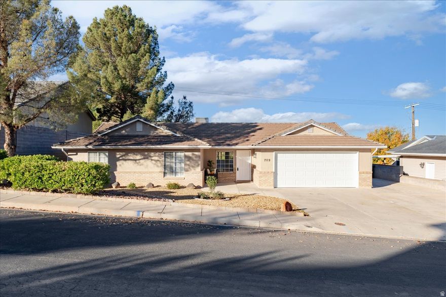 Imagine the beautiful sunsets from your back patio on this tastefully updated single level home with red mountain and valley views.  Remodeled in 2025 with new granite countertops, energy star stainless steel appliances, carpet, LVP, and more.  Freshly painted interior.  HVAC replaced in 2017.  New water heater, garage door motor, and smoke alarms.  Centrally located with easy access to Sunset and Bluff.  Near restaurants, movie theater, stores, minutes to Snow Canyon, Tuahacan, Dixie Red Hills Golf Course.  Priced to sell.