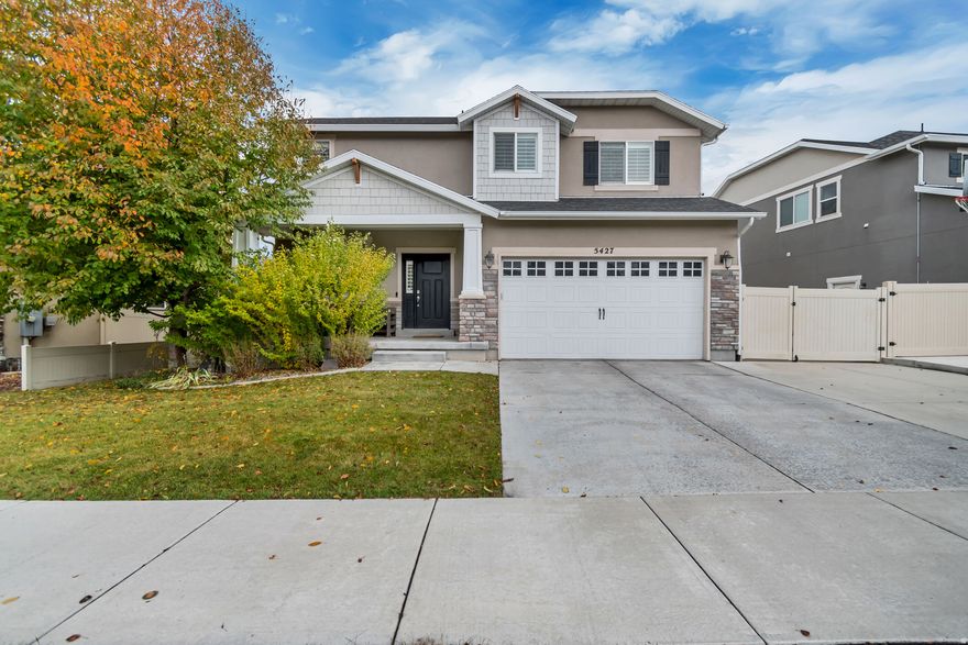 This beautiful two story home in Herriman boasts a comfortable and functional floorplan with big open spaces that flow perfectly! The open concept kitchen/family room area is the perfect main gathering spot in the home! A generous amount of windows provides ample natural light throughout the day. The Kitchen is warm and inviting with beautiful granite countertops, gorgeous white cabinets, laminet flooring and stainless steel appliances! The spacious master bedroom features an ensuite bathroom and an enormous walk-in closet! 4 bedrooms upstairs, 1 bedroom in the basement!  The east facing backyard means you can enjoy shady summer BBQs or family gatherings in the fully fenced and landscaped backyard. Easy access to Bangerter Hwy and Mtn View Corridor and just minutes away from schools, the county rec center, library, shopping, dining and entertainment. This is an absolutely lovely neighborhood with a neighborhood park and great neighbors! Put this home on your must see list!