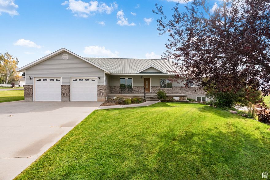 Welcome to this spacious and versatile property nestled in the peaceful countryside of Preston. The fully finished basement offers a separate entrance, private garage, and additional off-street parking makes this a great setup for guests, rental income, extended family.  Upstairs enjoy the large family rooms, open concept kitchen and large bedrooms.  Step outside and soak in the natural beauty with two decks overlooking the mountains, open fields, and big skies, this home is made for peaceful mornings and sunsets.  Square footage figures are provided as a courtesy estimate only and were obtained from county records. Buyer is advised to obtain an independent measurement. Call today for a private showing!
