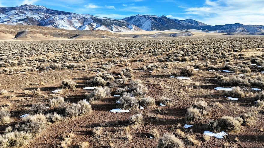 This 100-acre Sevier County property is located just outside Monroe, Utah, on the southern end of the Sevier Valley. The land features flat terrain, established road access, sage and native grasses, grazing history, and borders Utah State Trust lands. Access to public trails and nearby town amenities is within a few miles.