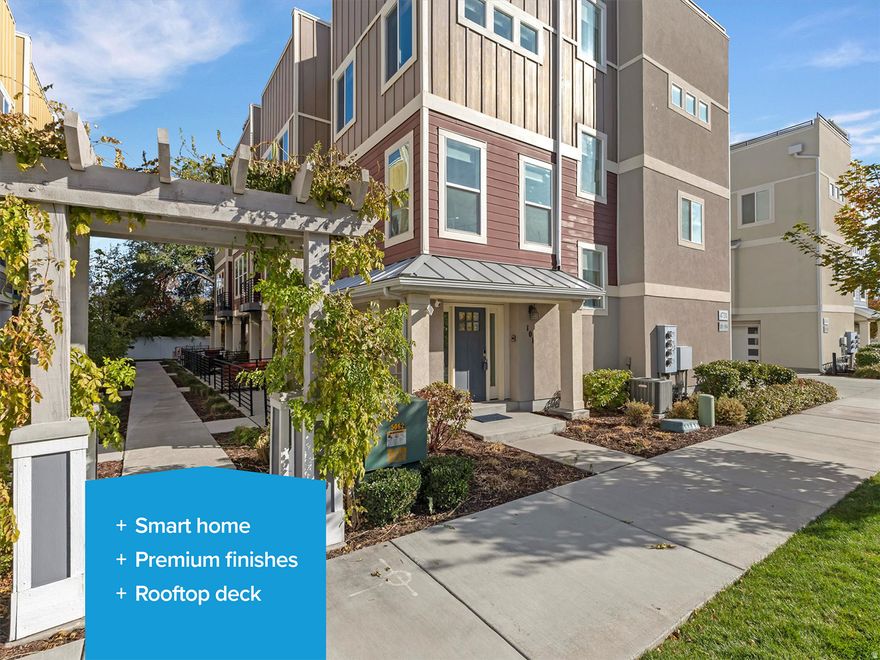 Don't miss this executive style, end-unit townhome in the vibrant Murray community of Granton Square that is loaded with smart home features, incredible designer selected finishes and audio visual upgrades. Starting with an advanced Control4 smart home system that seamlessly integrates entertainment, comfort, lighting, and security. Enjoy unmatched home theater sound with a Marantz receiver and amps powering 8.1.1 Dolby ATMOS surround sound with a 75" Samsung Quantum Dot 4K Smart TV and Apple TV for all streaming needs. See attached video and description. Hunter Douglas PowerView shades offer app-controlled light and privacy settings, including blackout options for a true theater experience. There is also whole-home audio from the foyer to the rooftop terrace, setting the mood for every occasion. The system also integrates security cameras, doorbell, and smart locks, along with HVAC control, intercom functionality, and remote access via the Control4 mobile app, delivering complete home automation and peace of mind, wherever you are. Next the exceptional custom kitchen showcases True Euro cabinets by Karman, finished in a rich charcoal ultra-matte full overlay with " hardwood dovetailed full-extension drawers, soft-close doors, pull-out trays, and a real wood Lazy Susan. Sleek open shelving is accented with LED full-spectrum lighting seamlessly integrated into the smart home system, while a one-of-a-kind imported octagonal encaustic Italian porcelain backsplash adds striking character. Anchored by stunning Ceseri Grey Brazilian quartzite countertops featuring a custom backlit waterfall leg and keyhole detail, stainless steel appliances, an island microwave, and a new refrigerator. The modern functionality is complemented by Brizio touch-sensitive black-and-gold pull-down faucet, matching black InstaHot, and a Blanco low-bridge composite sink. Finishing touches include a garbage disposal with black countertop air switch and upgraded black electrical outlets with integrated USB plugs. Upstairs, the luxurious primary suite offers a serene retreat bathed in natural light, featuring expansive windows, a walk-in closet, and a spa-inspired ensuite complete with a soaking tub, separate shower, and dual vanity. Embrace the beauty of the community's scenic open space or you can retreat to one of your three private outdoor door spaces including a serene main-level patio, a deck off the great room, and a rooftop terrace offering breathtaking valley and mountain vistas. This extraordinary unit also has an attached 2-car garage with ample space to park or store your gear. Perfectly positioned in the heart of the valley, this Murray location offers effortless access to parks, trails, premier shopping and dining, top-rated schools, major freeways, UTA Trax and Intermountain Medical Center.